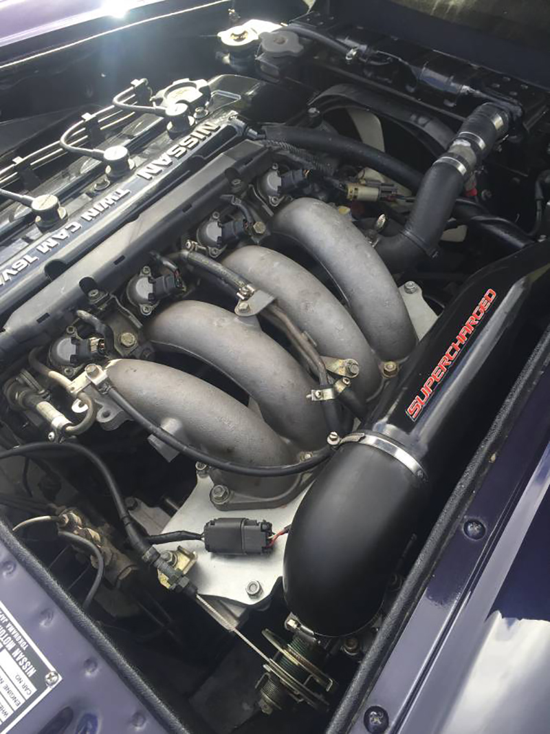 Illustration for article titled This Supercharger Has a Datsun Roadster Attached to It